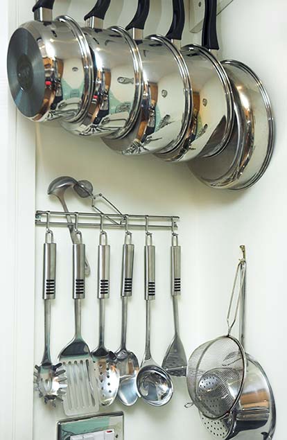 Pots & Pans Hanging in Small Kitchen